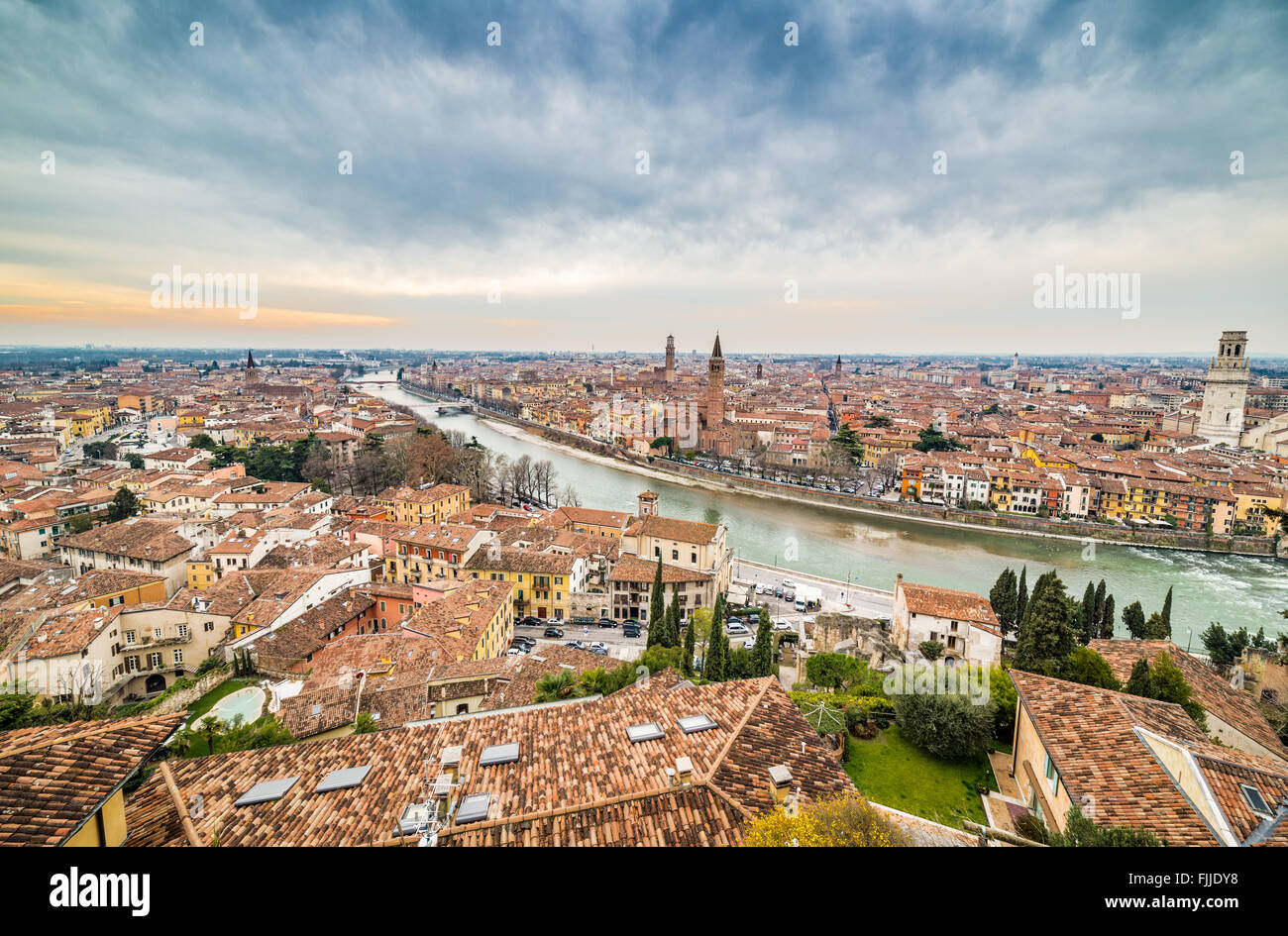 panorama of the Adige River as it passes through the houses and ...