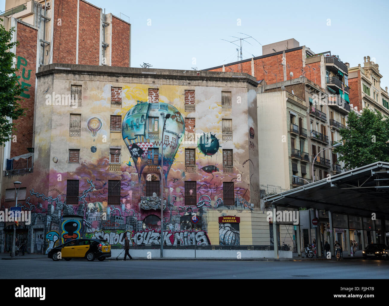 Mural at corner of Carrer del Comte d'Urgell and Carrer de Floridablanca in Sant Antoni neighborhood Barceona, Spain Stock Photo