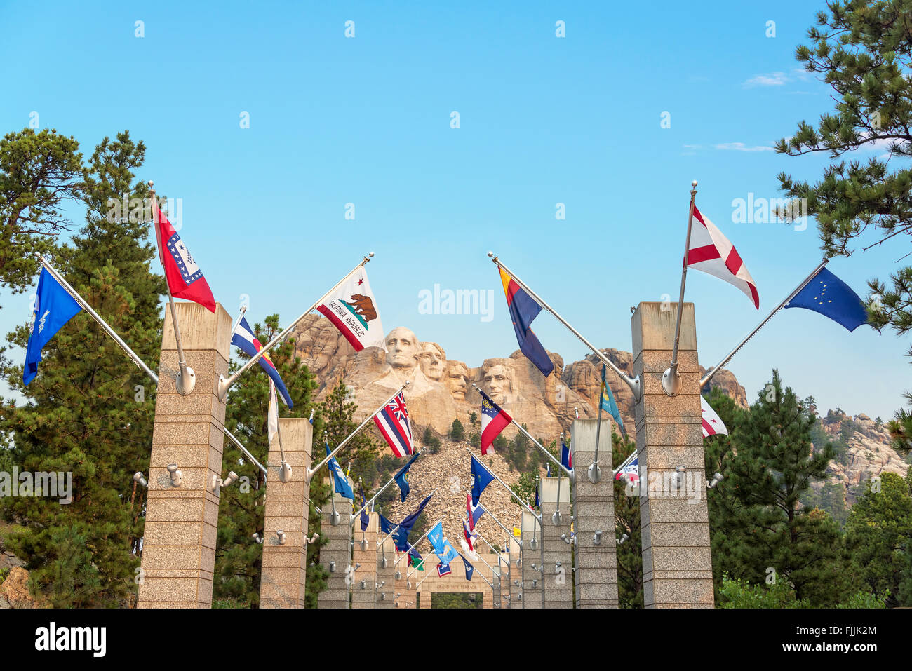 Row of state flags leading to Mount Rushmore in Keystone, South Dakota Stock Photo