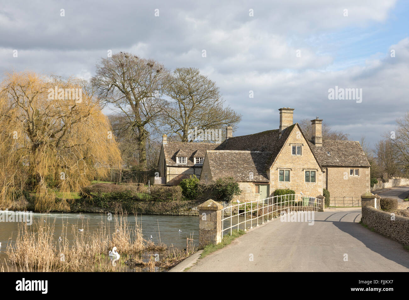 Fairford Mill on the River Coln in the Cotswold market town of Fairford, Gloucestershire, England, UK Stock Photo