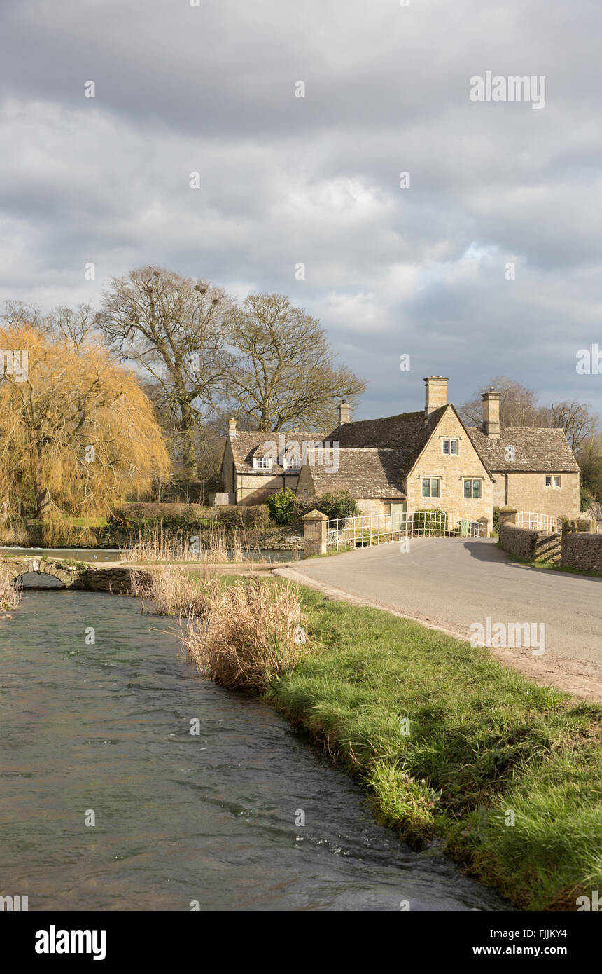 Fairford Mill on the River Coln in the Cotswold market town of Fairford, Gloucestershire, England, UK Stock Photo