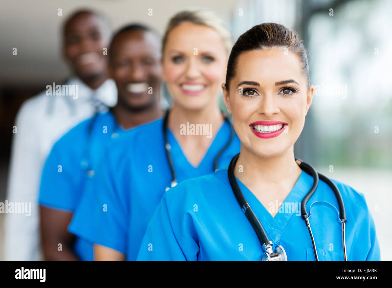 group of modern medical professionals in hospital Stock Photo