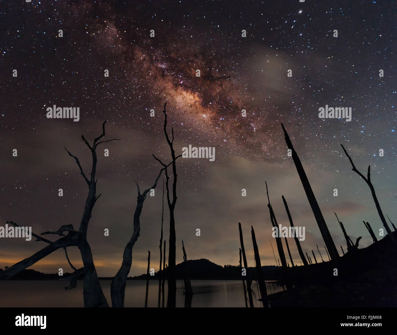 The milky way and the landscape during the night Stock Photo - Alamy