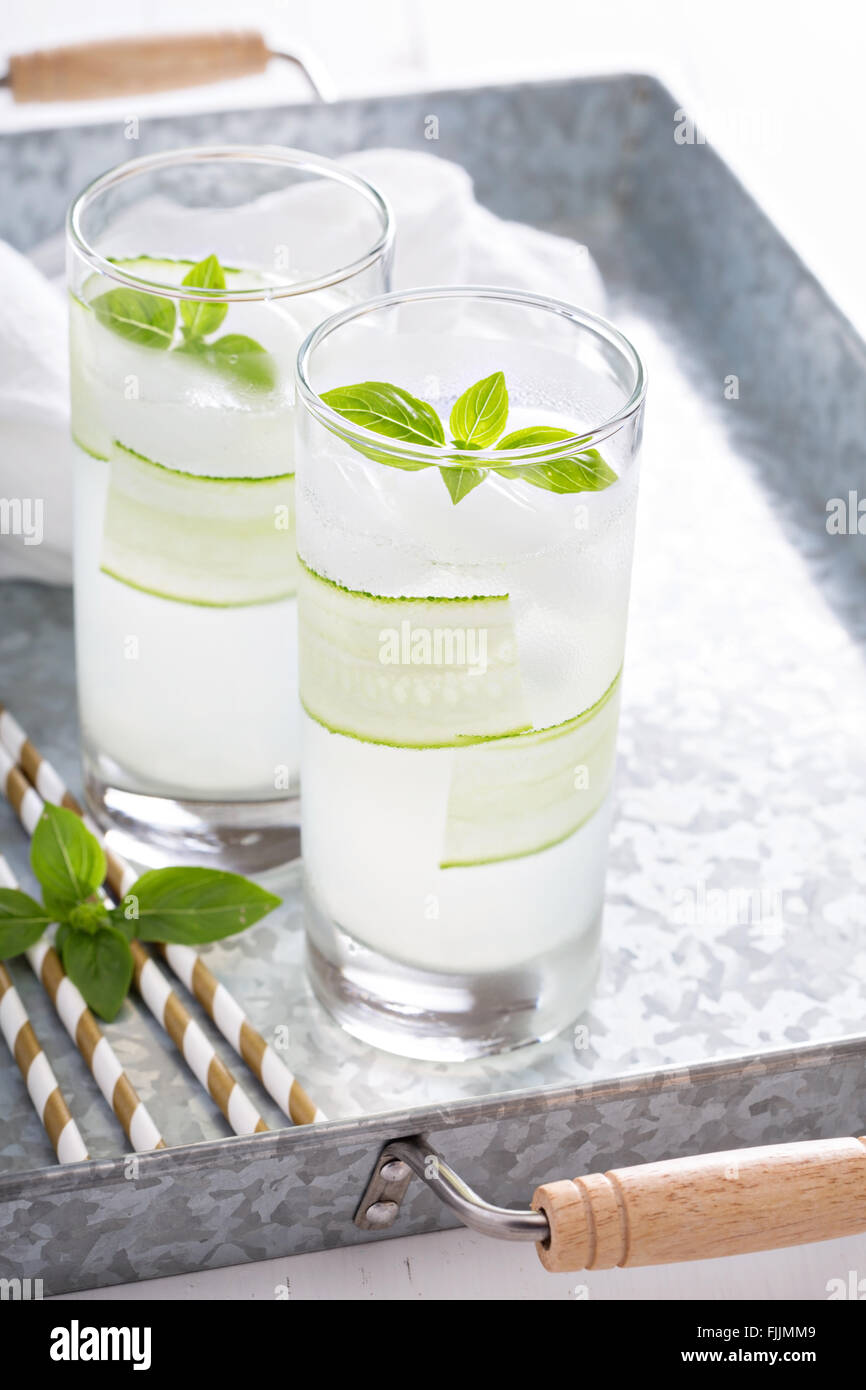 Basil cucumber sparkling drink in tall glasses Stock Photo Alamy