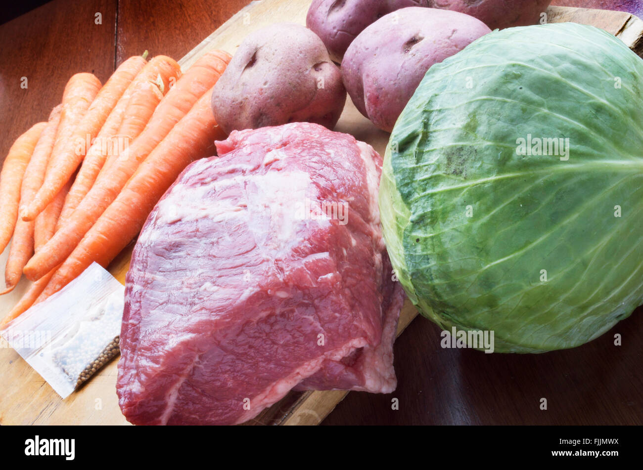 Corn Beef Cabbage, Carrots, Potatoes in the Raw State Stock Photo