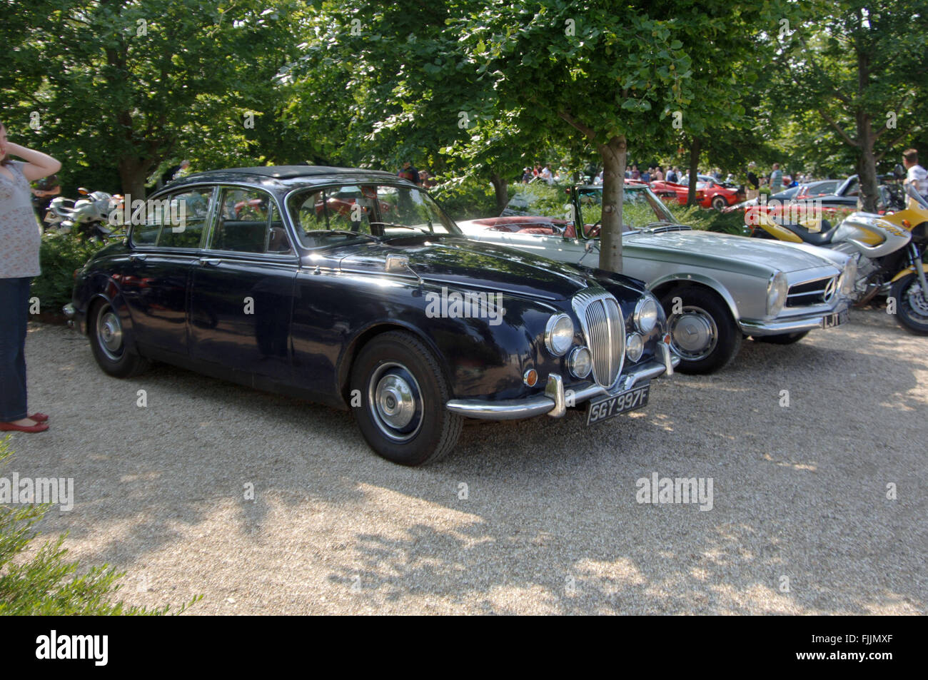 Classic super cars at a Goodwood Breakfast club meet, Daimler V8 and Mercedes Stock Photo