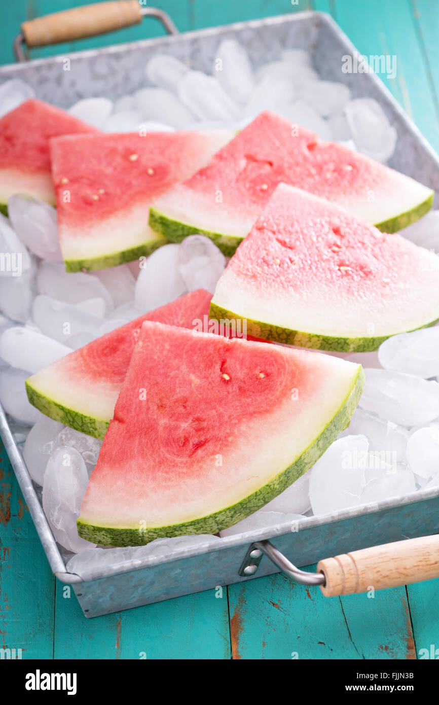 Watermelon slices on ice Stock Photo