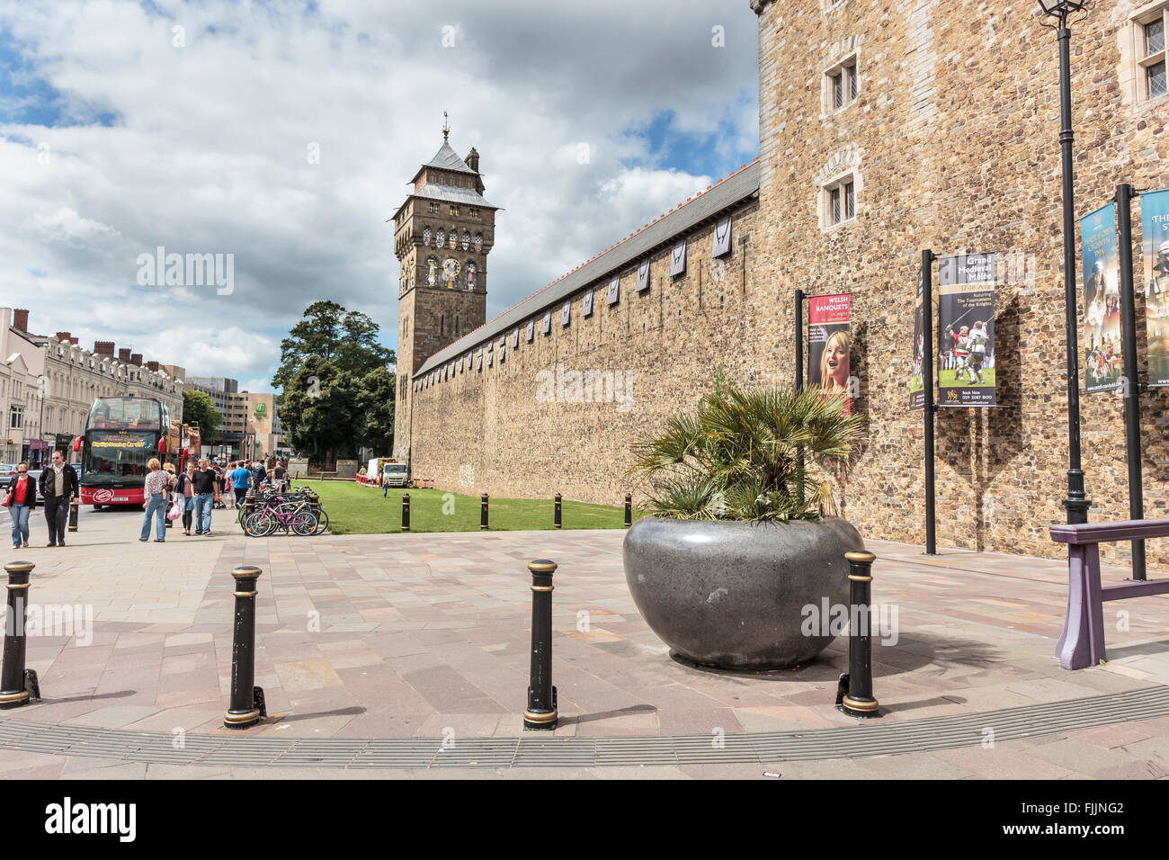 Entrance to Cardiff Castle, Caerdydd, looking towards clock tower and the River Taff from Castle Street. Stock Photo