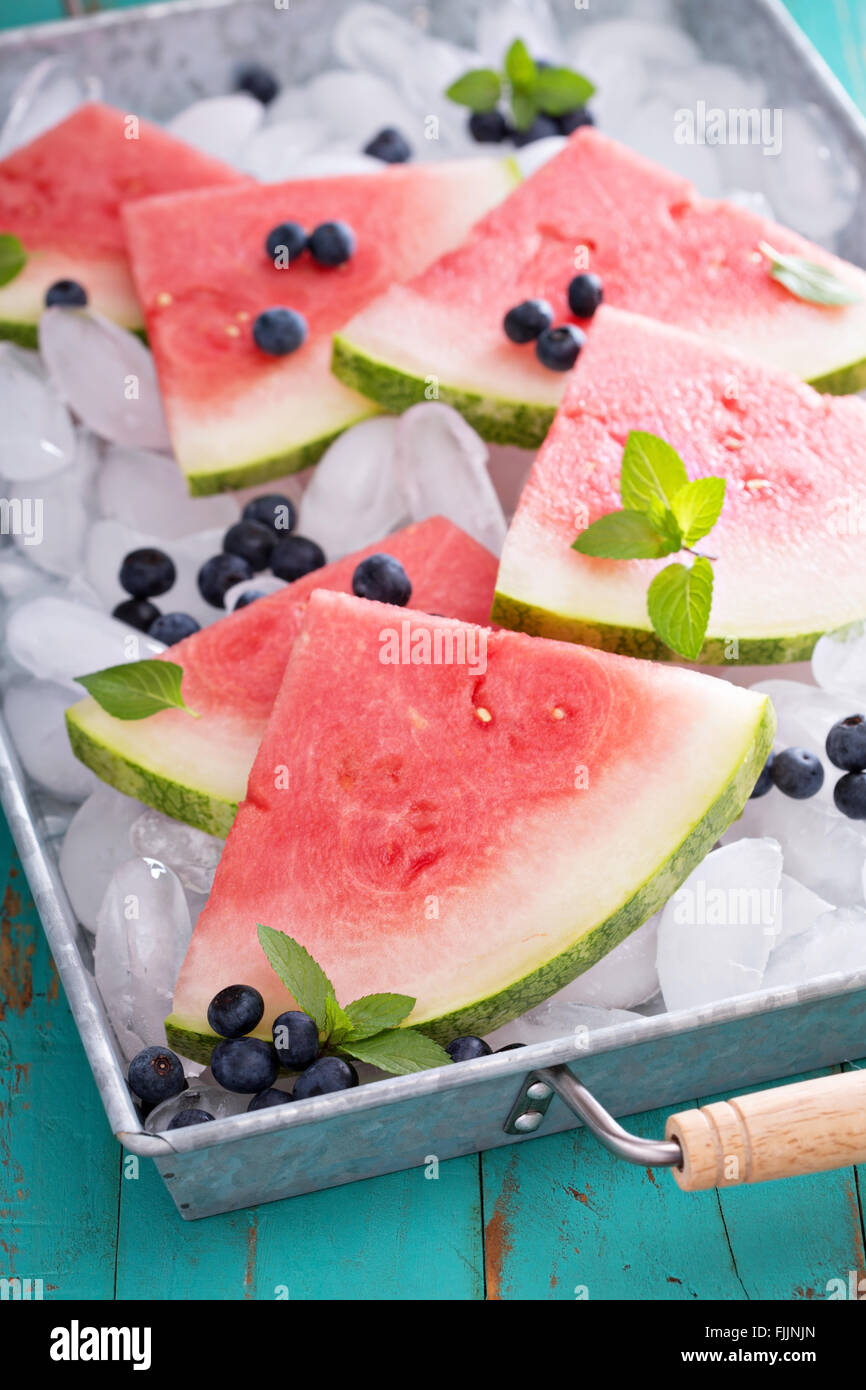 Watermelon slices on ice Stock Photo