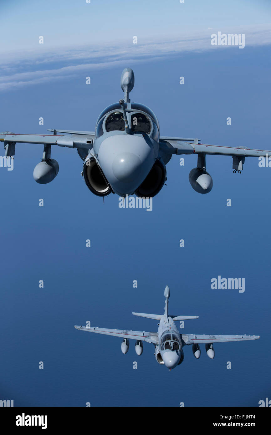 A U.S. Marine Corps EA-6B Prowler electronic attack aircraft fly in formations during aerial refueling March 1, 2016 near Cherry Point, North Carolina. Stock Photo