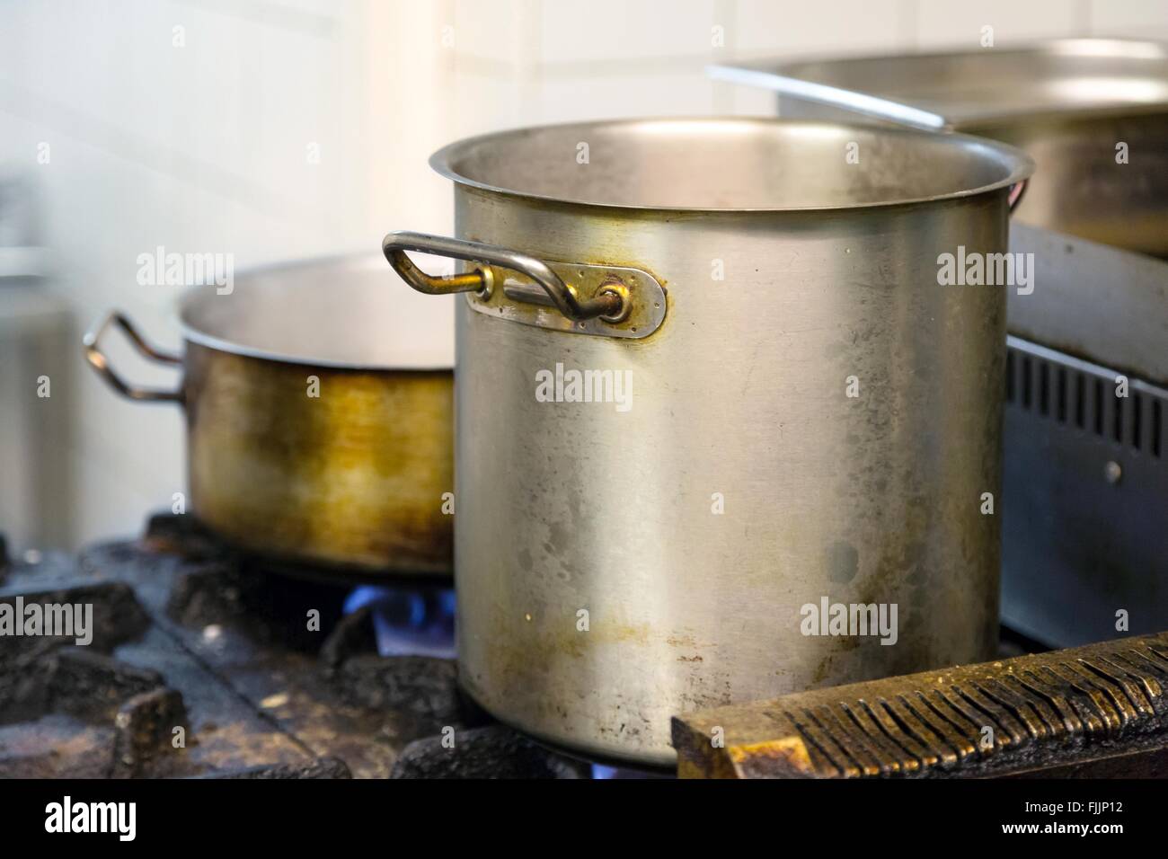 Pots on the gas cooker Stock Photo Alamy
