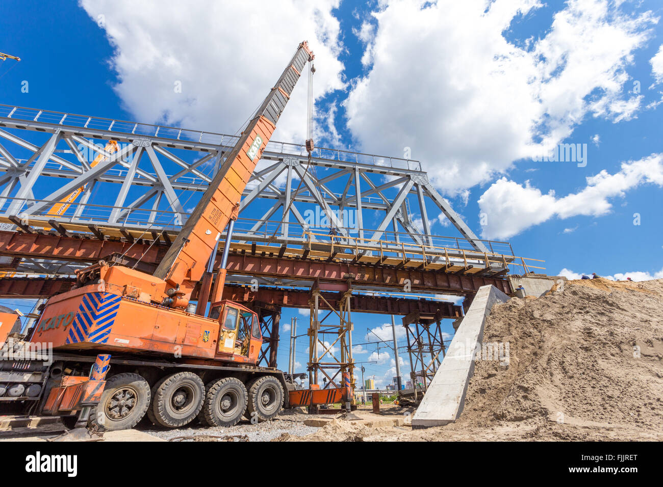 The Crane working near bridge Stock Photo Alamy