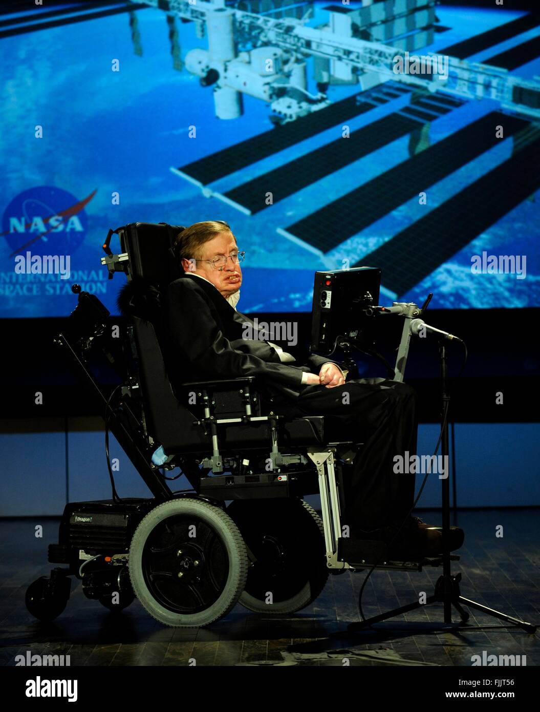 Dr. Stephen Hawking, a professor of mathematics at the University of Cambridge, delivers a speech entitled 'Why we should go into space' during a lecture that is part of a series honoring NASA's 50th Anniversary, Monday, April 21, 2008, at George Washington University's Morton Auditorium in Washington. Stock Photo