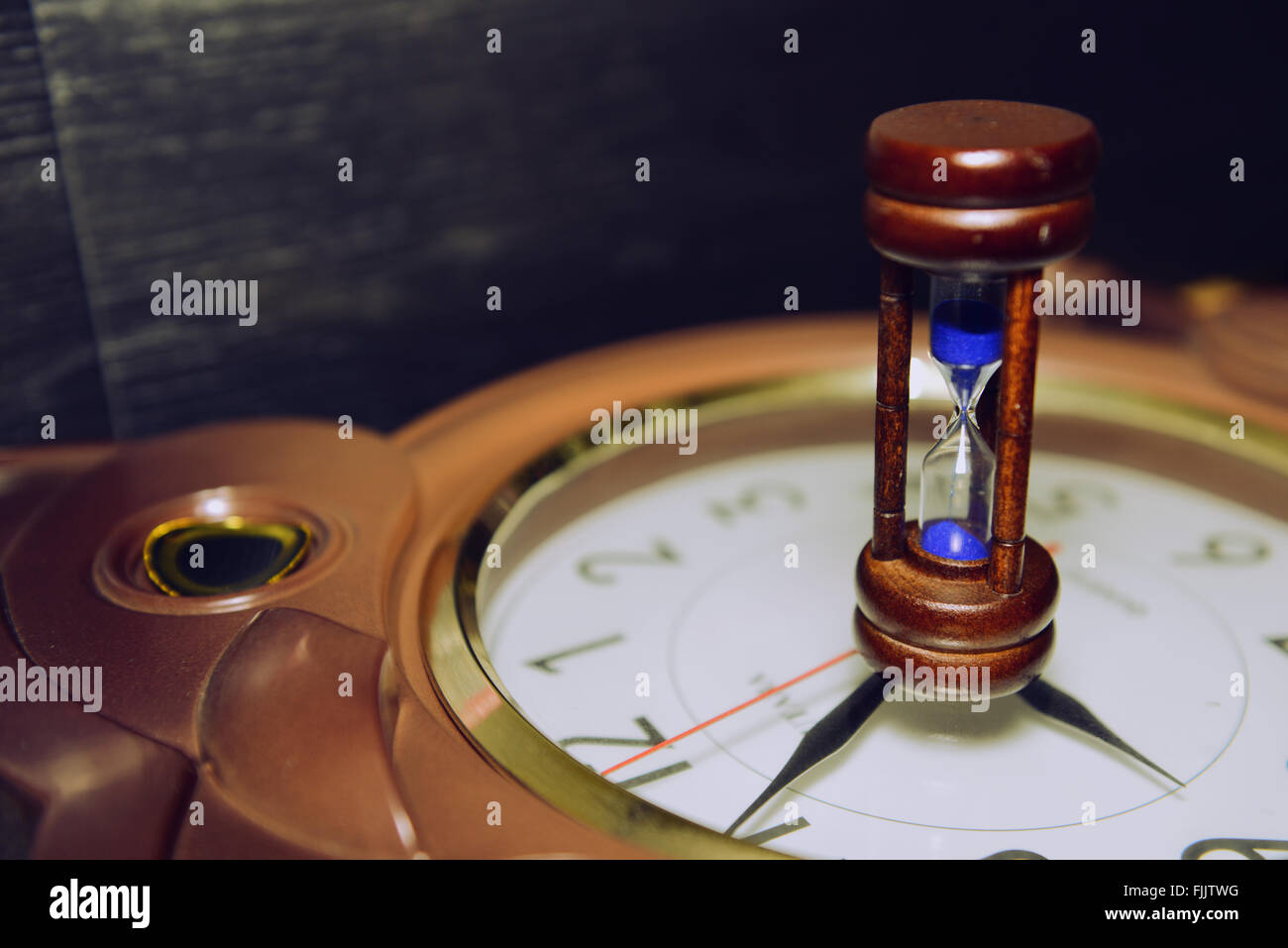 Hourglass on the clock Stock Photo