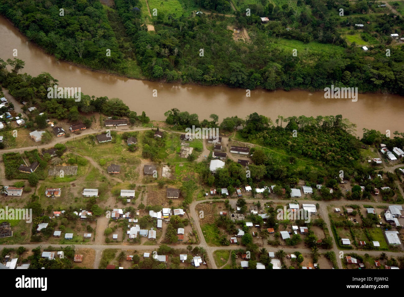 Homes in a town along the Amazon river in Ecuador near Guayaquil Stock Photo