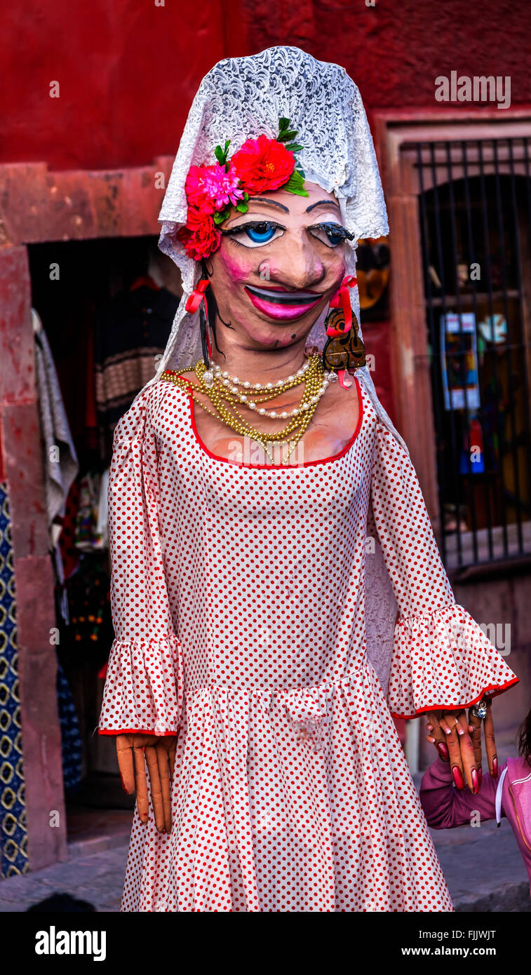 Tall Walking Puppet Mascot Jardin Town Square San Miguel de Allende Mexico. Stock Photo