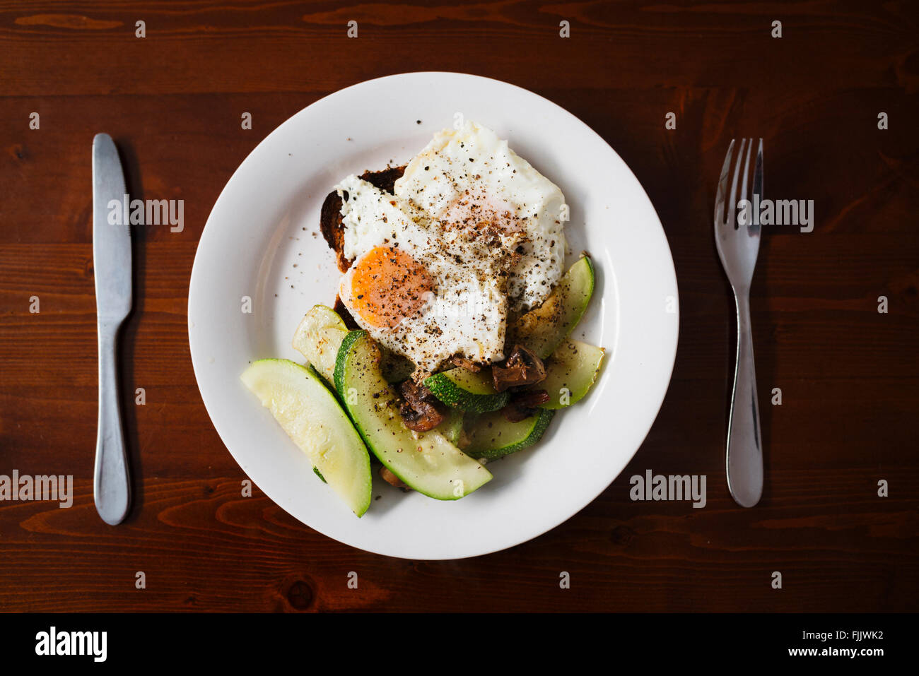 Healthy breakfast, eggs and courgette Stock Photo