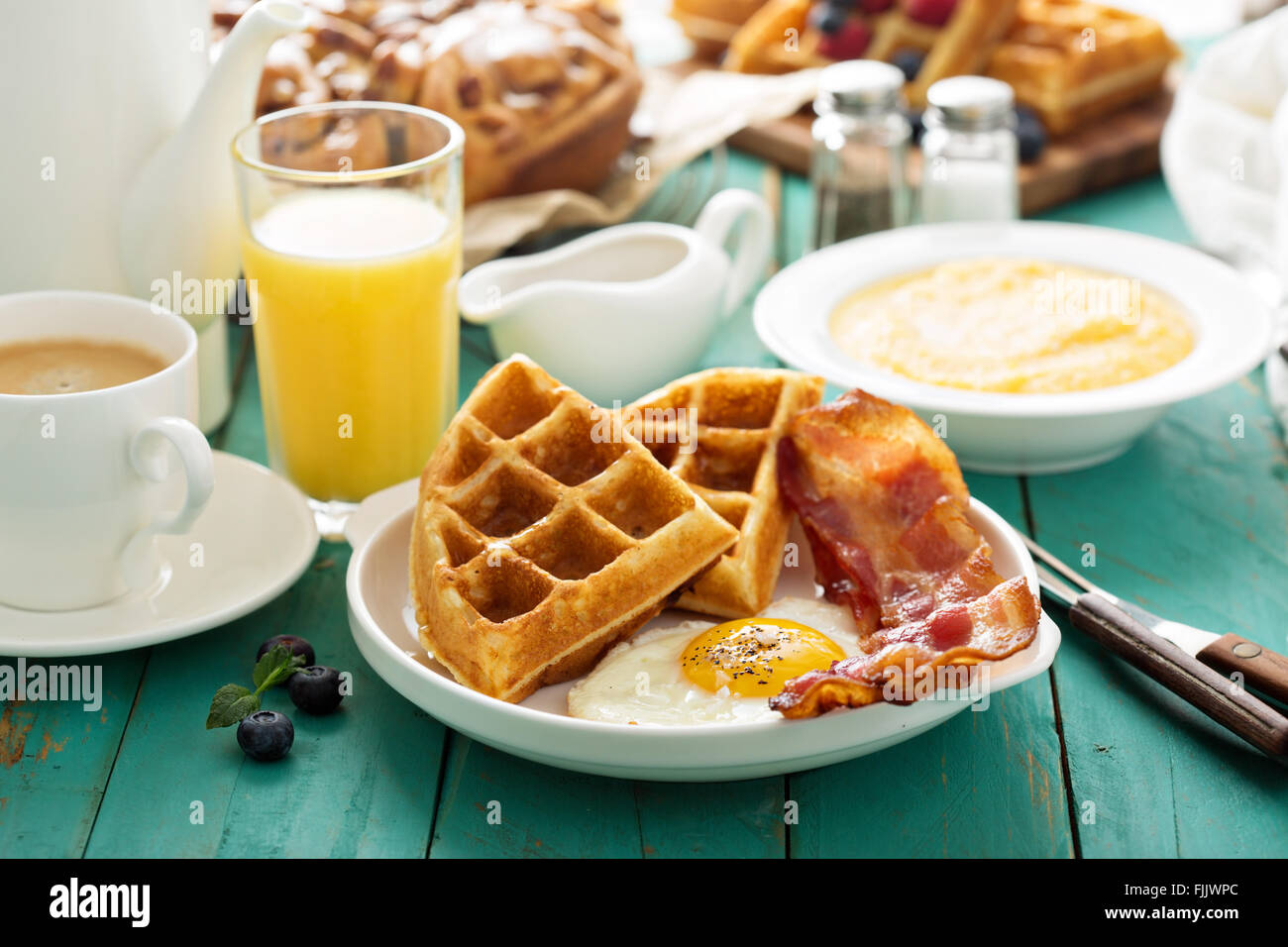 Southern cuisine breakfast with waffles Stock Photo Alamy