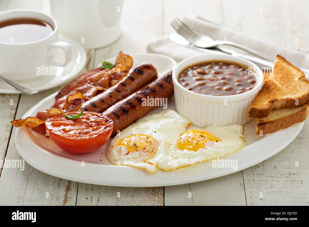 Full english breakfast with egg and bacon Stock Photo Alamy