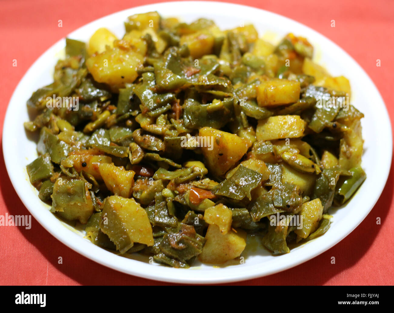 Potato and beans with traditional Indian spices Stock Photo Alamy