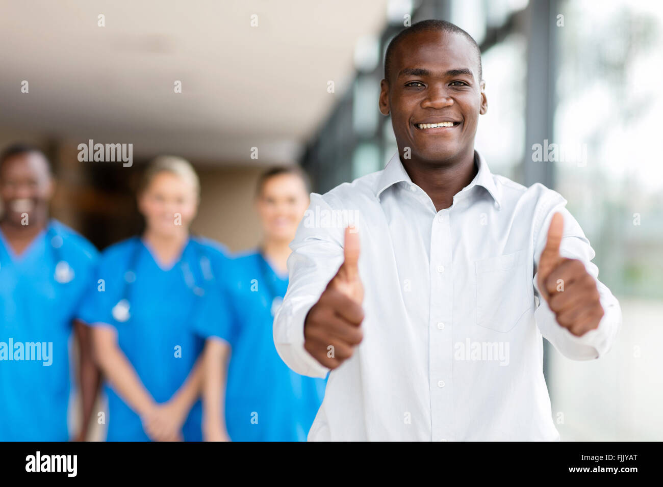 Happy black man thumbs up hi-res stock photography and images - Alamy