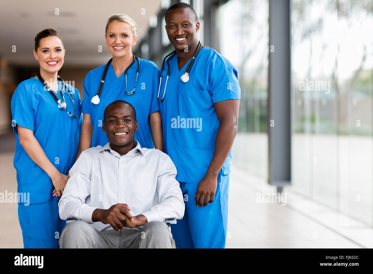 professional health workers and disabled patient Stock Photo