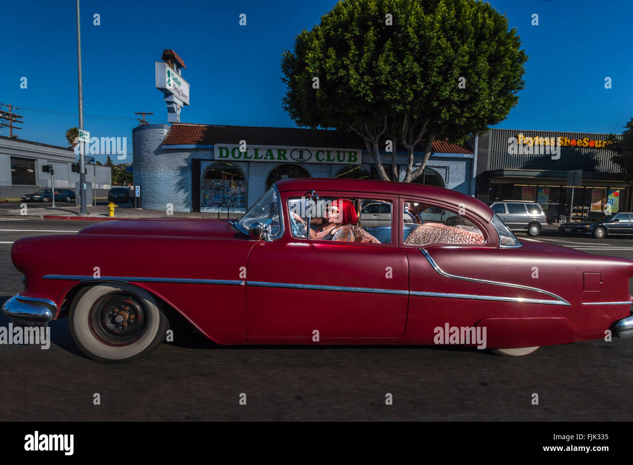 LOS ANGELES, CA – JUNE 29: Female latina’s driving through Los Angeles, California on June 29, 2005. Stock Photo