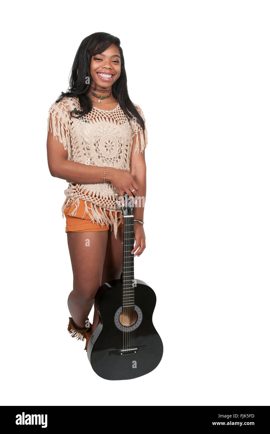 Beautiful young woman playing an acoustic guitar Stock Photo - Alamy