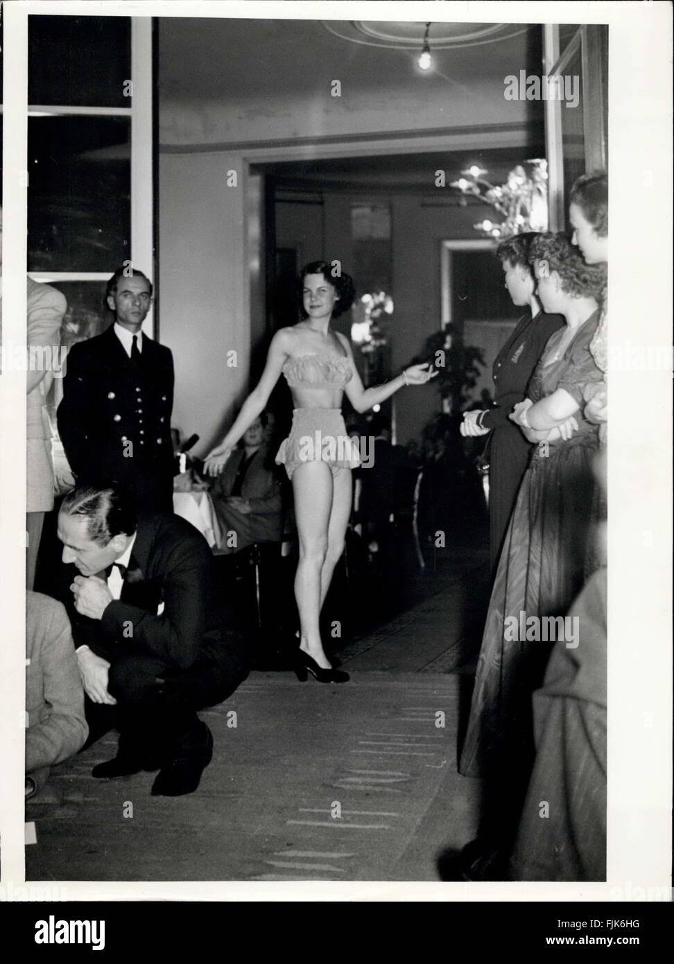 1958 - The art of strip-tease is as much in the & concealing s in the
