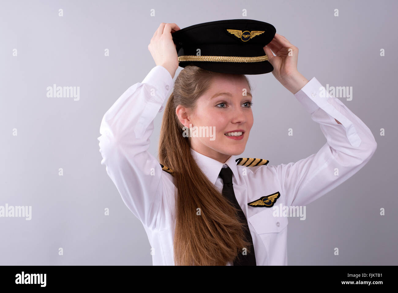Female pilot uniform hi-res stock photography and images - Alamy