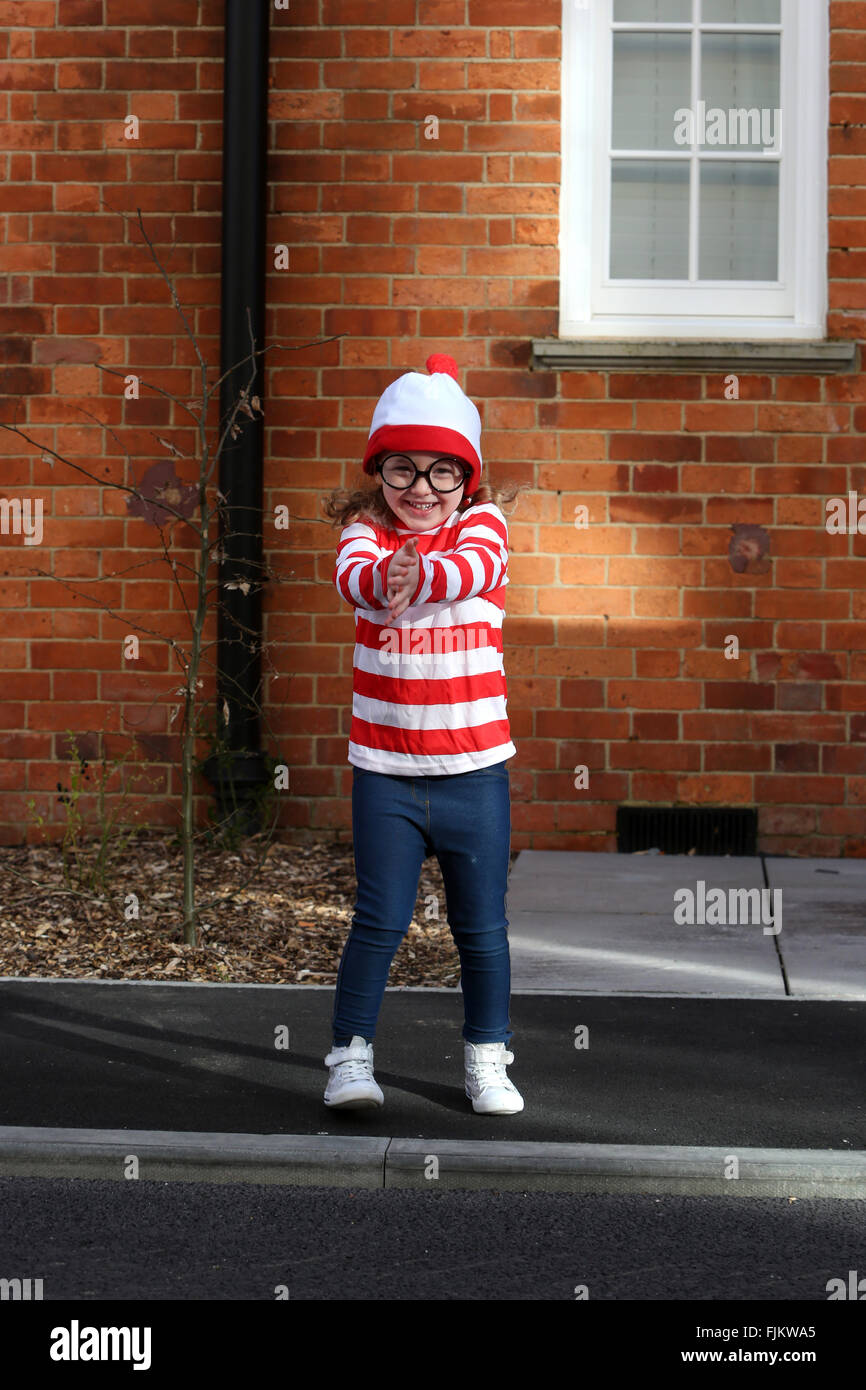 Chichester, UK. 3rd March, 2016. Isabelle, 4, pictured dressed as Where's Wally Book character on her way to nursery on World Book Day, Chichester, West Sussex, UK. Credit:  Sam Stephenson/Alamy Live News. Stock Photo