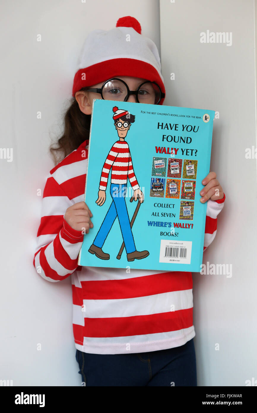 Chichester, UK. 3rd March, 2016. Isabelle, 4, pictured dressed as Where's Wally Book character on her way to nursery on World Book Day, Chichester, West Sussex, UK. Credit:  Sam Stephenson/Alamy Live News. Stock Photo