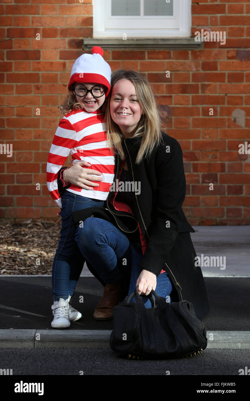 Chichester, UK. 3rd March, 2016. Isabelle, 4, (pictured with her Mum Kelly) dressed as Where's Wally Book character on her way to nursery on World Book Day, Chichester, West Sussex, UK. Credit:  Sam Stephenson/Alamy Live News. Stock Photo