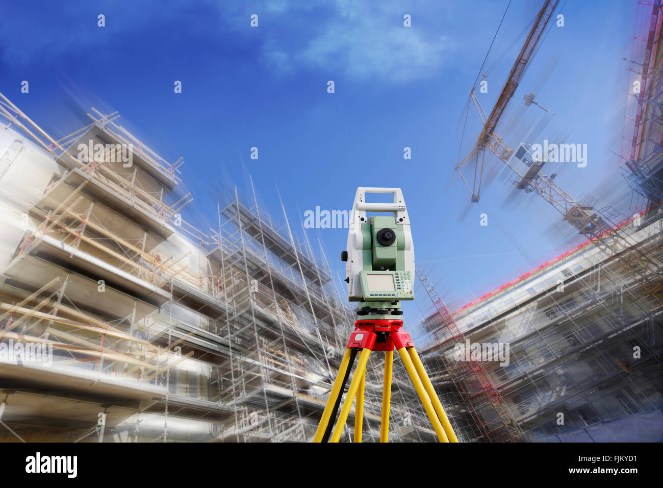 surveyors measuring instrument and construction industry Stock Photo