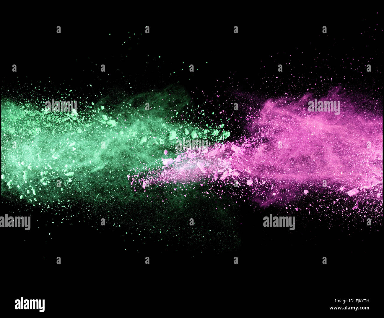 Explosion of colored powder on black background Stock Photo - Alamy
