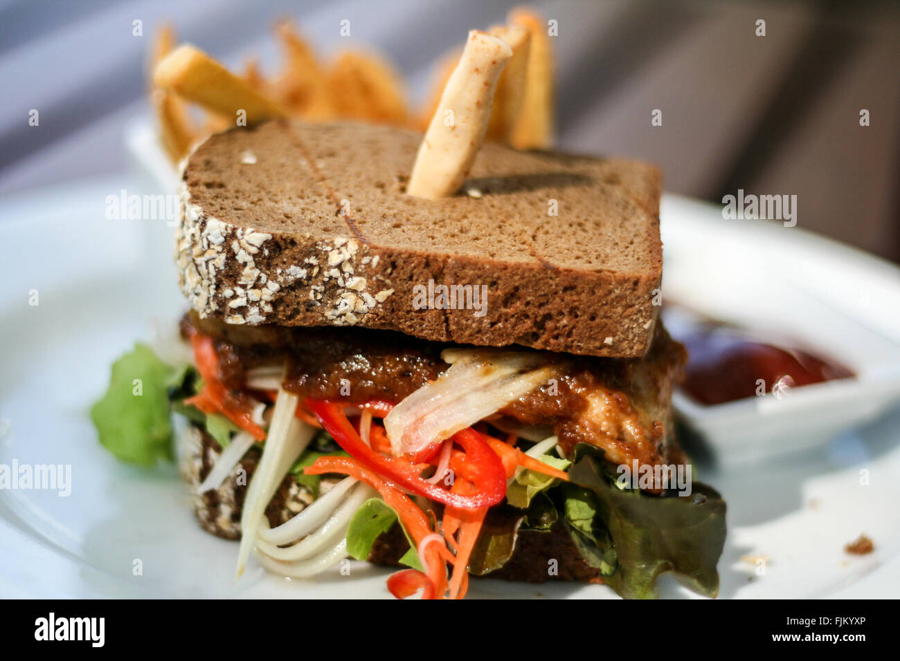 Gluten free chicken sandwich with chips, Sarojin Hotel, Khao Lak, Thailand Stock Photo
