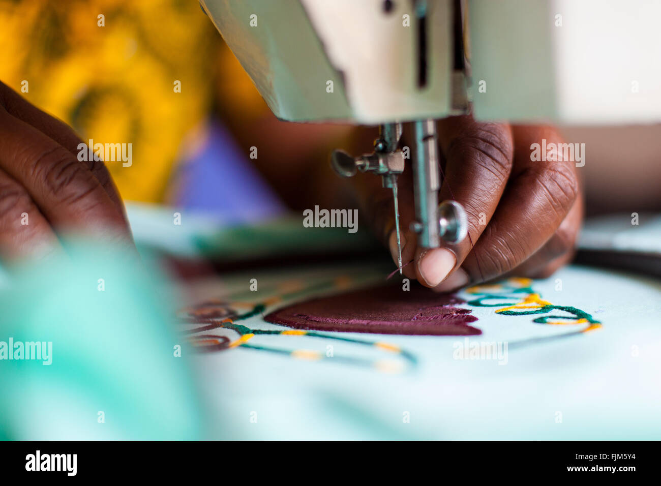 A women using a sewing machine, Tanzania Stock Photo Alamy