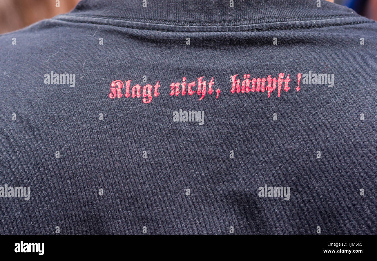 t -shirt bearing the imprint : don´t complain, fight, in fraktur or gothic letters Stock Photo