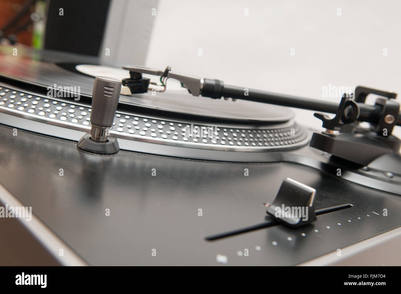 Old style vinyl record spinning on a turntable Stock Photo