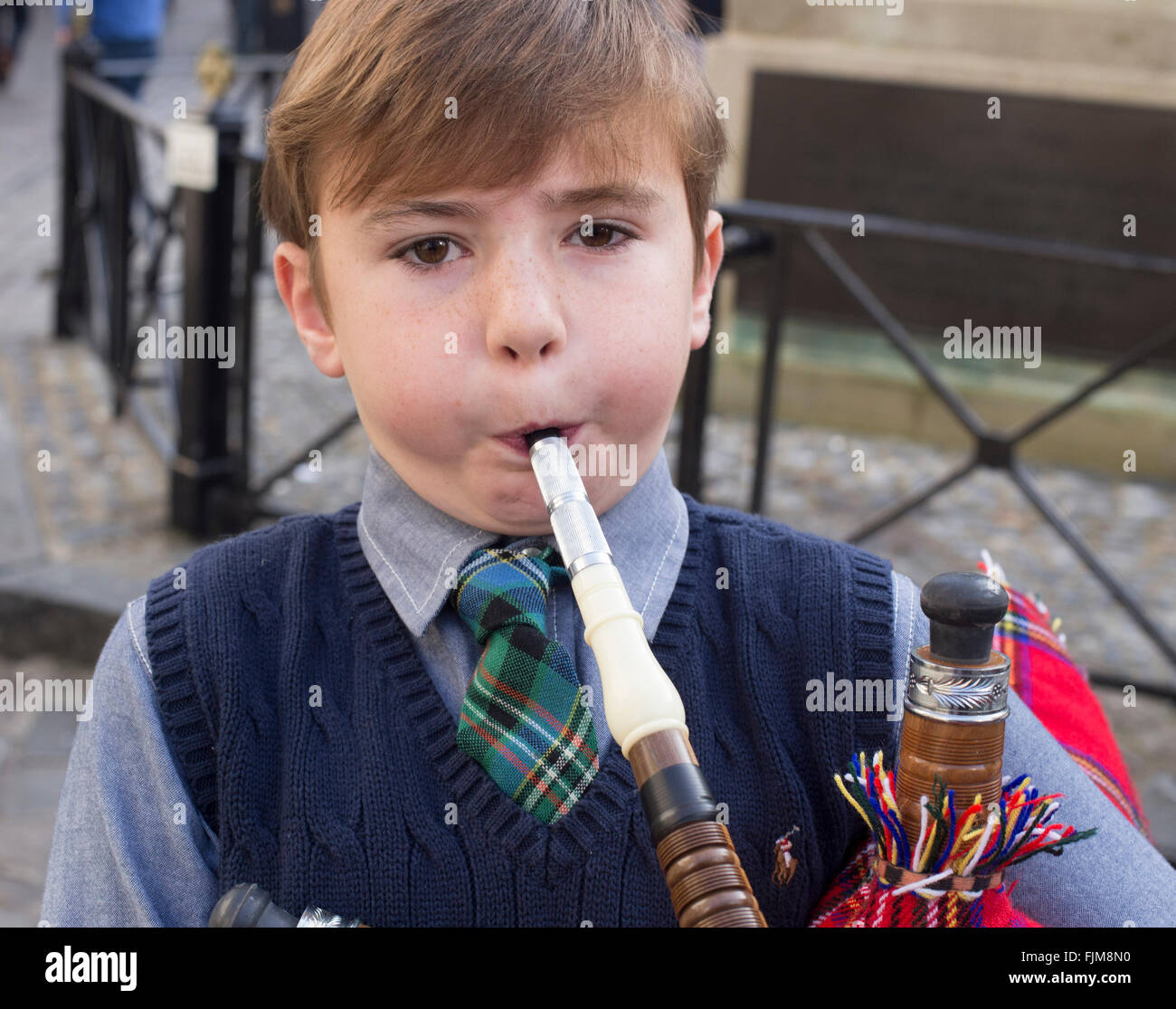 Young boy playing the Bagpipes Stock Photo