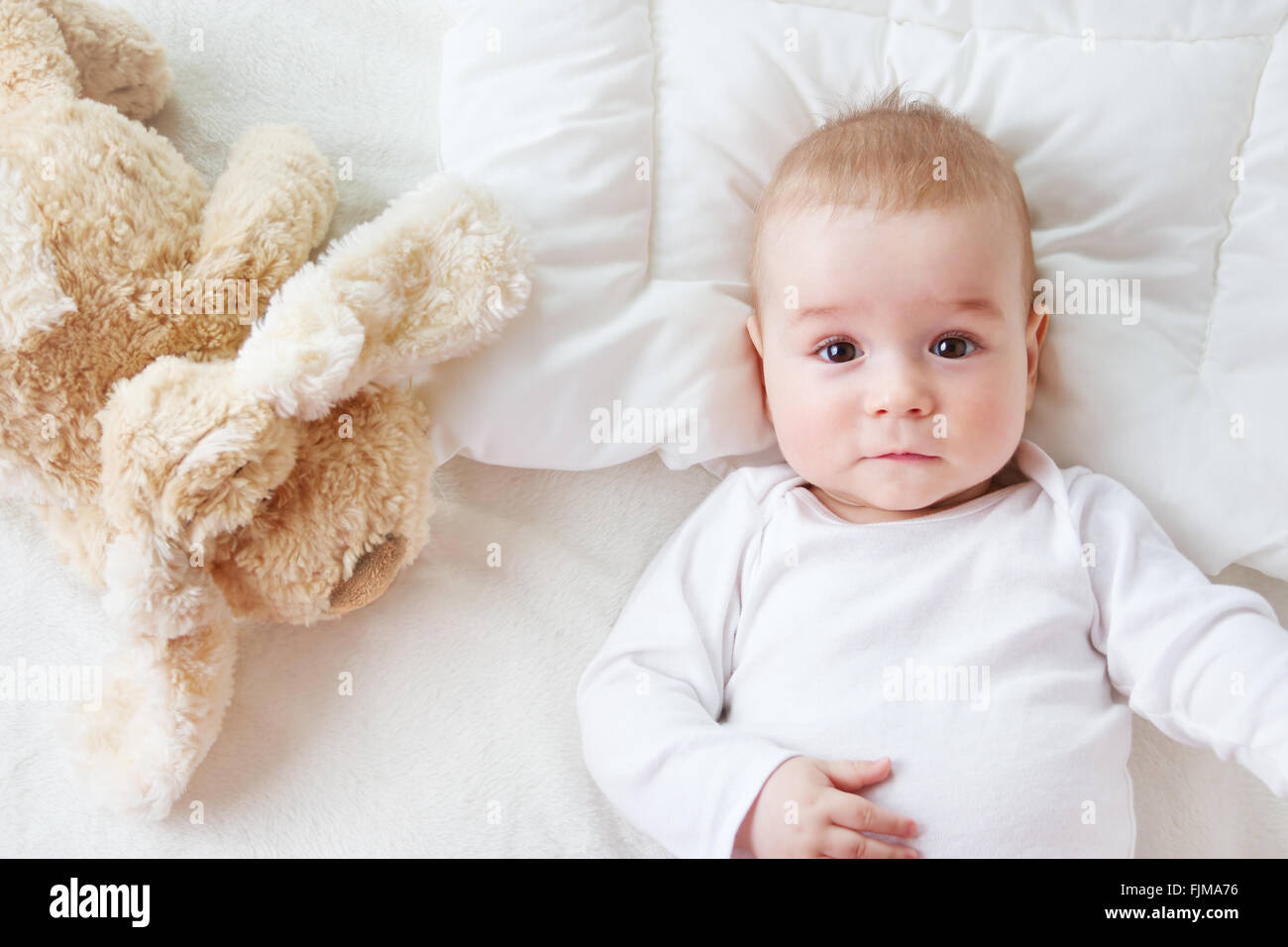 seven month old baby in the bed Stock Photo Alamy