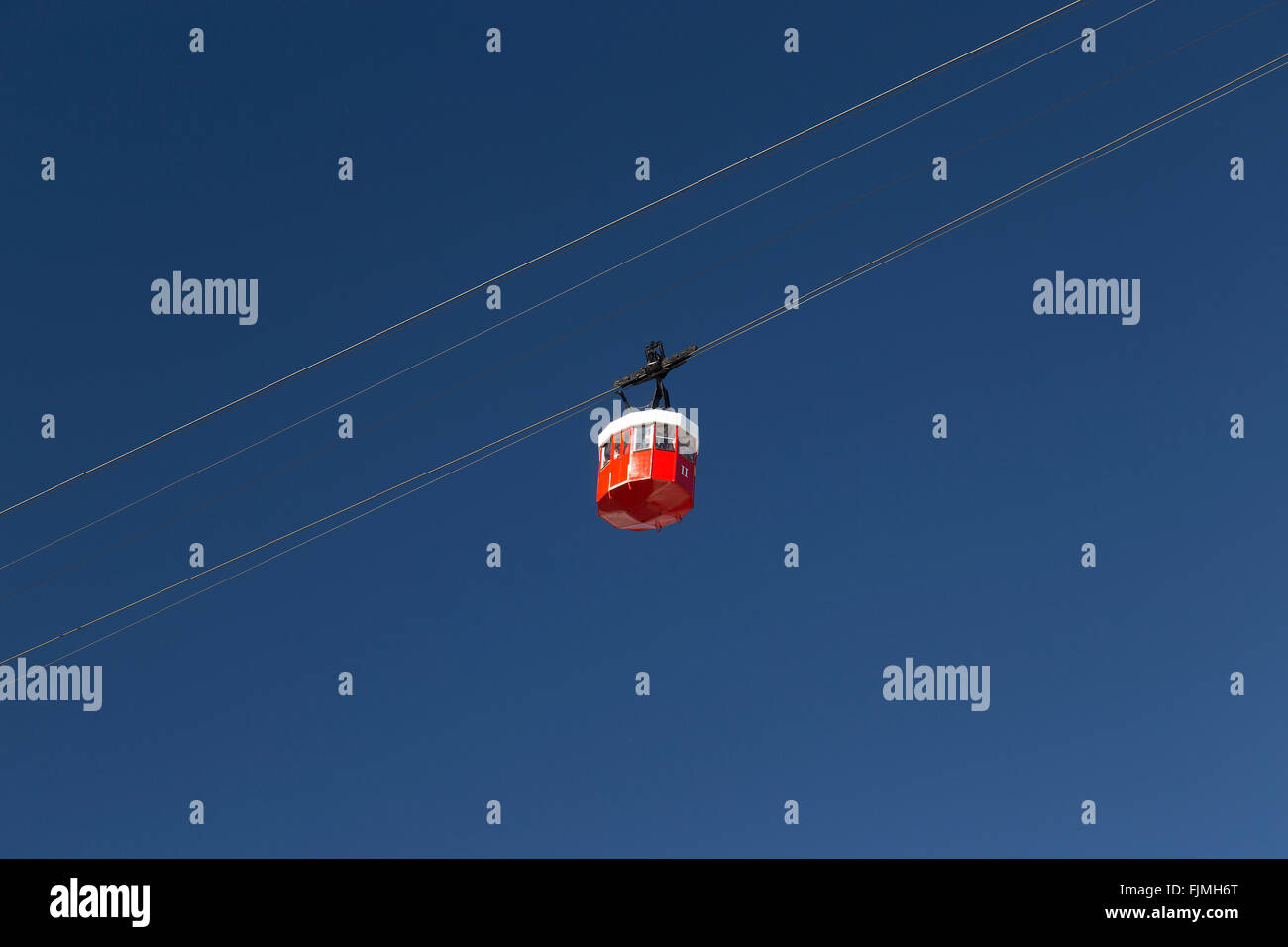 Barcelona cable car cabin port against a clear blue sky Stock Photo - Alamy
