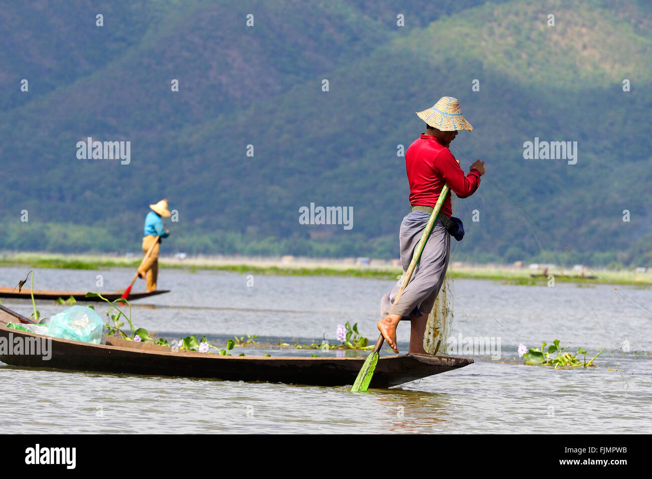 Fishing, fisherman, Myanmar. Man traditional fishing at 'Inle Lake', Myanmar, Asia Stock Photo