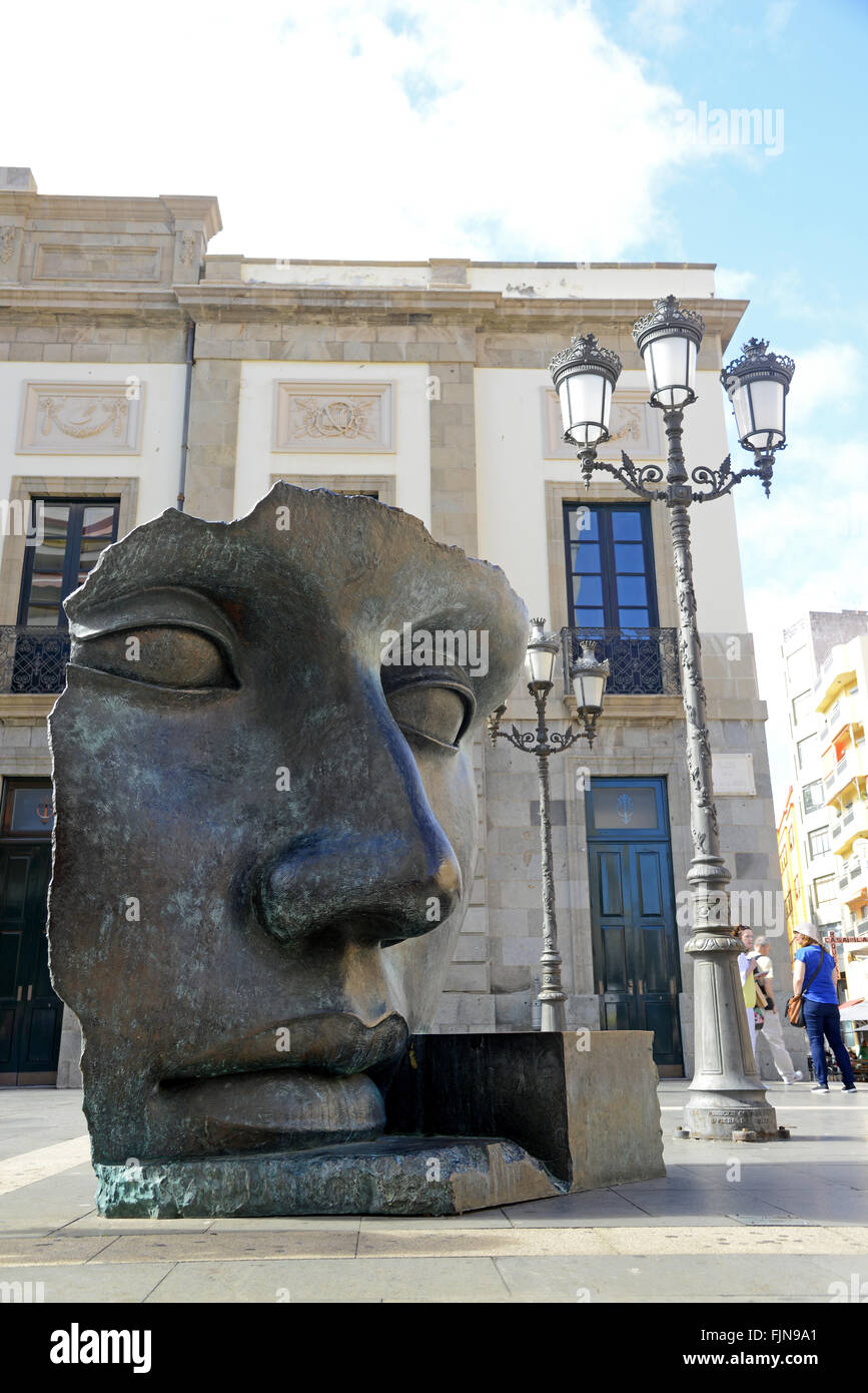 Sculpture of a face by Igor Mitoraj in front of the Guimera Theatre, Santa Cruz de Tenerife, “Canary Islands” Stock Photo