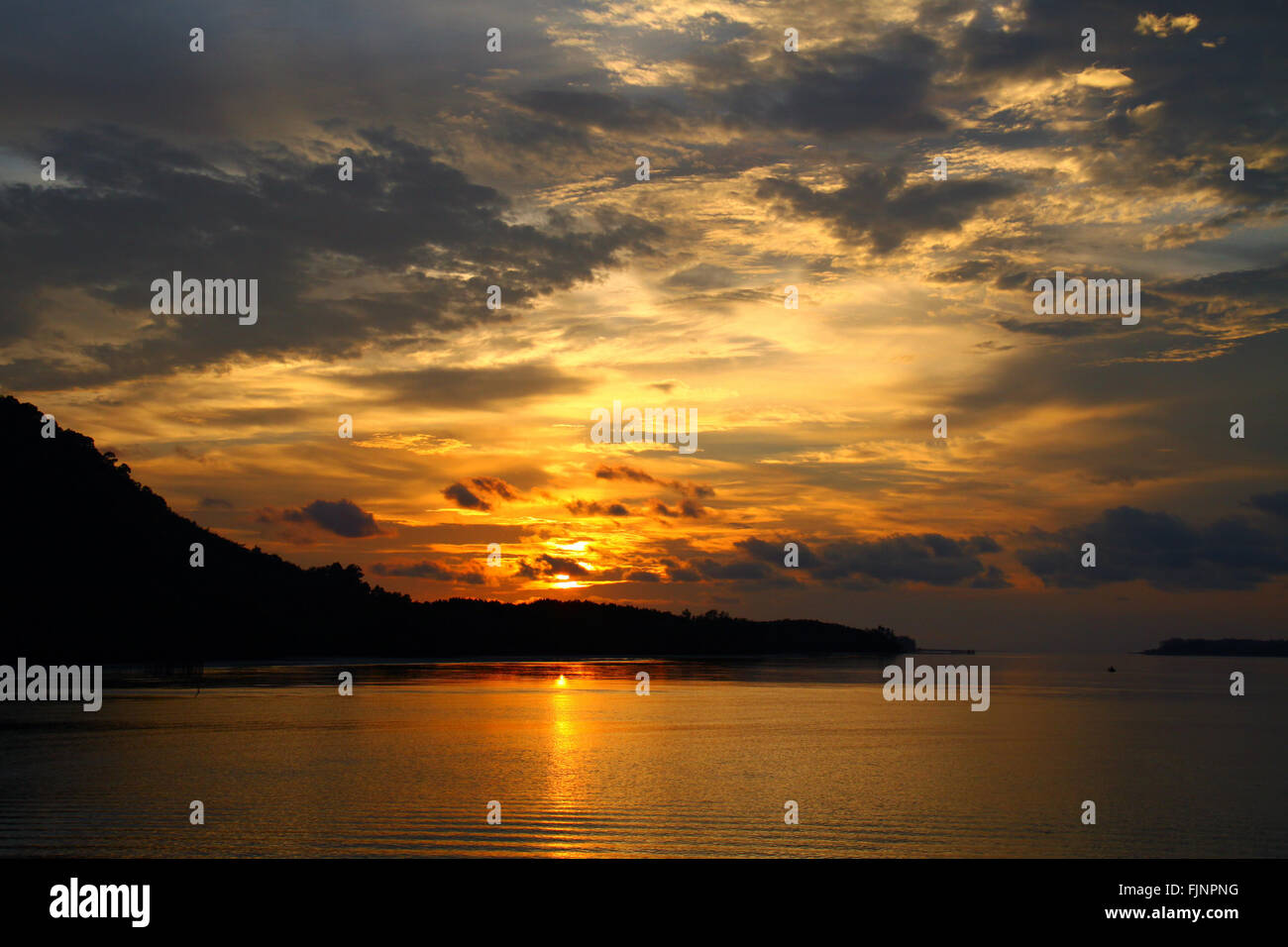 Golden sunset sky in Southern of Thailand Stock Photo