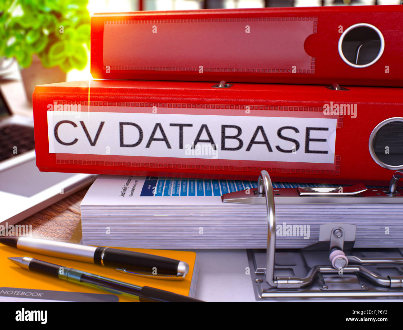 Red Ring Binder with Inscription CV Database Stock Photo - Alamy