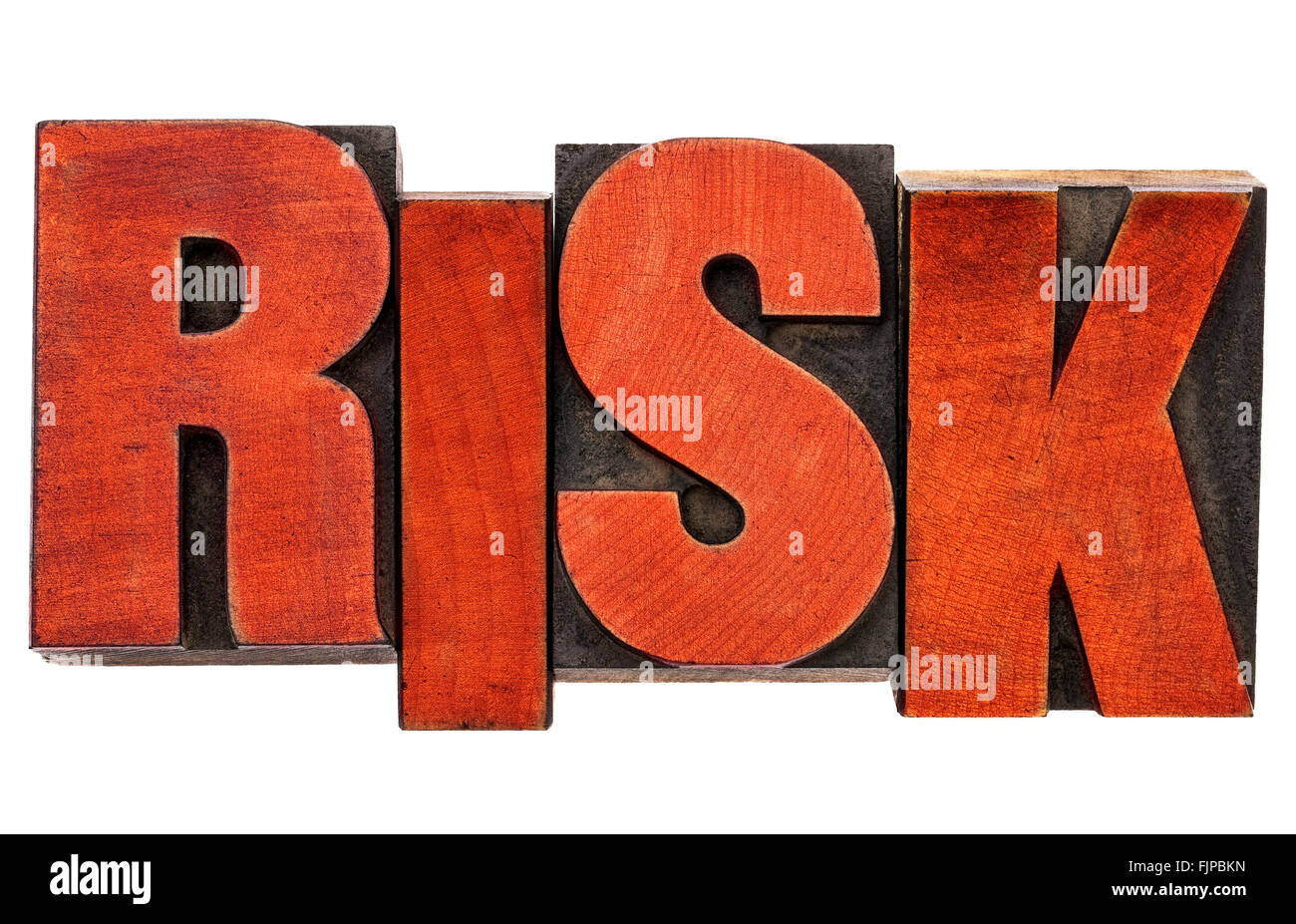 risk - isolated word abstract  in vintage letterpress wood type stained by red ink Stock Photo