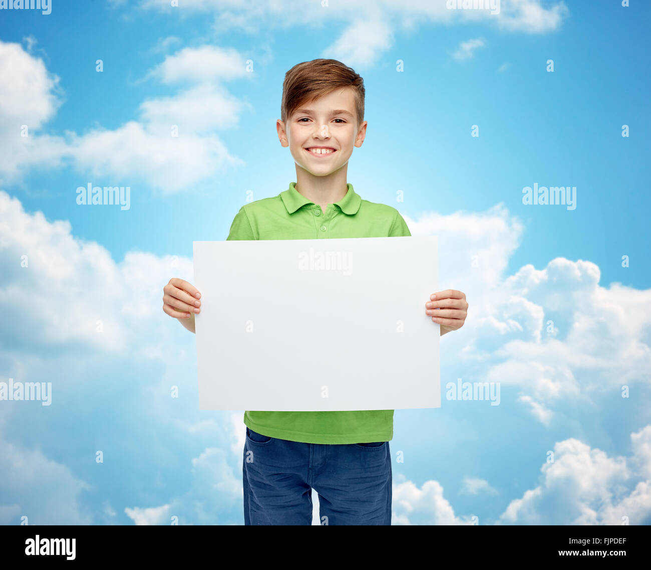 happy boy in t-shirt holding white blank board Stock Photo - Alamy