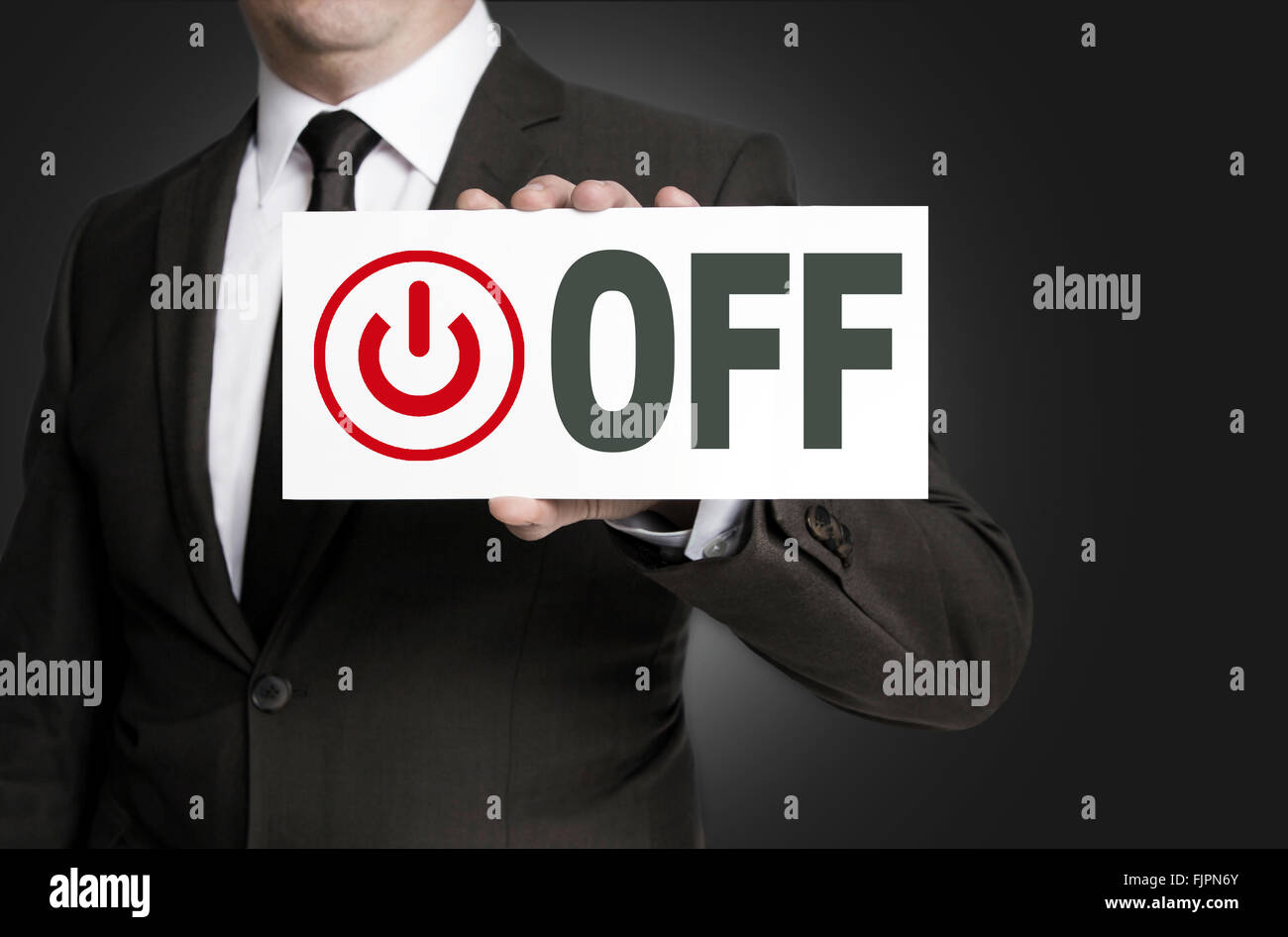 off placard is held by businessman background. Stock Photo