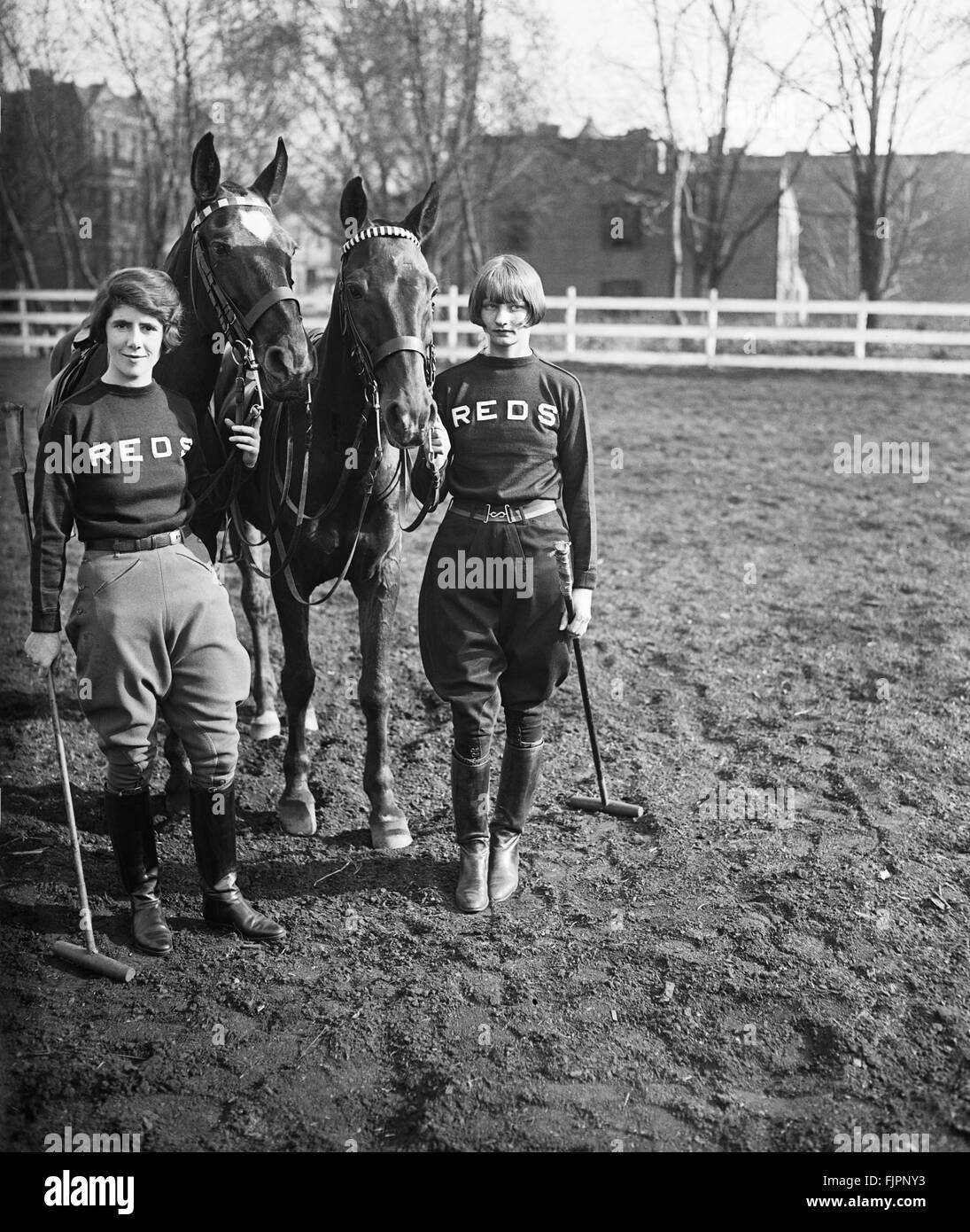 Two Female Polo Players Standing with Horses, Portrait, USA, Harris & Ewing, 1925 Stock Photo